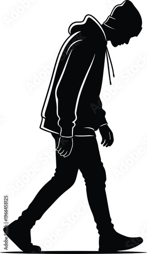 Silhouette of a person walking with head down
