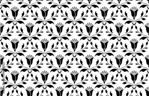 Floral pattern. Seamless vector background. Vintage wallpaper in the Baroque style. White and black ornament for fabric, wallpaper, packaging. Ornate Damask flower illustration.