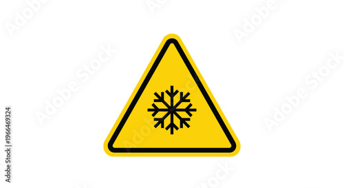 Yellow triangular warning sign with a black border and a snowflake symbol indicating cold weather or freezing conditions.