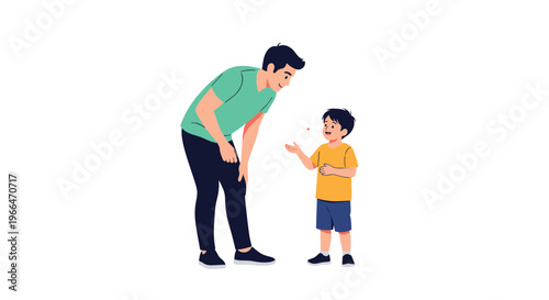 Caring father figure bending down to talk and listen to his young son in a heartwarming moment of parenting and childhood communication.