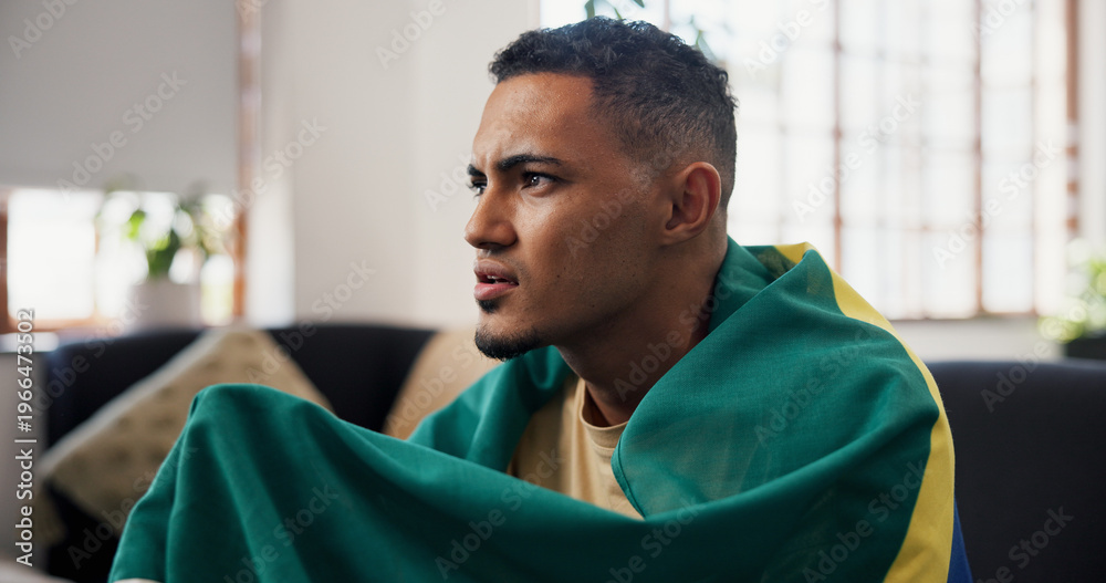 Fototapeta premium Man, anxiety and watching tv in home with sports match, concern and suspense for football competition. Person, stress and nervous in lounge with tension, flag and broadcast for soccer world cup game.