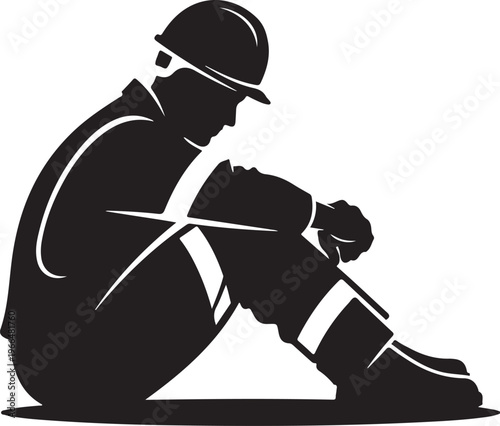 Construction worker sitting down taking a break outside work