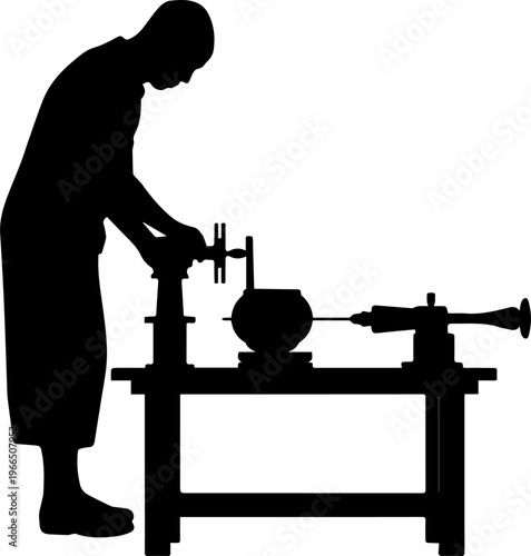 Black Silhouette of an Artisan Craftsman Working at a Lathe Machine on a Workbench Vector Illustration