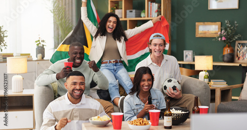 Tableau sur toile Excited, watching tv and friends with celebration in home for South African win, sports goal or snacks