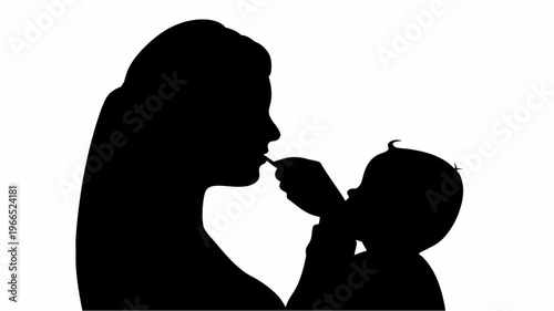Nurturing mother feeding baby in silhouette mom caring for infant loving family moment