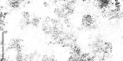 Abstract black and white grunge splotch texture overlay. heavy grain clustered speckle distressed background for artistic design effects with speckle pattern with clustered dots with rough surface