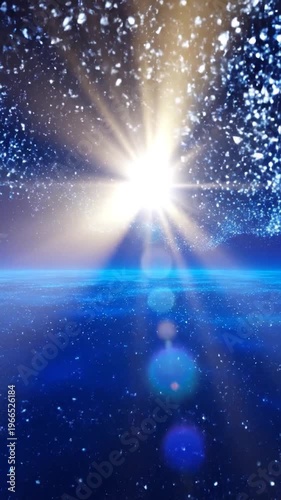 A bright, radiant star shines intensely, casting luminous rays across a vast, deep blue expanse filled with sparkling cosmic dust and distant