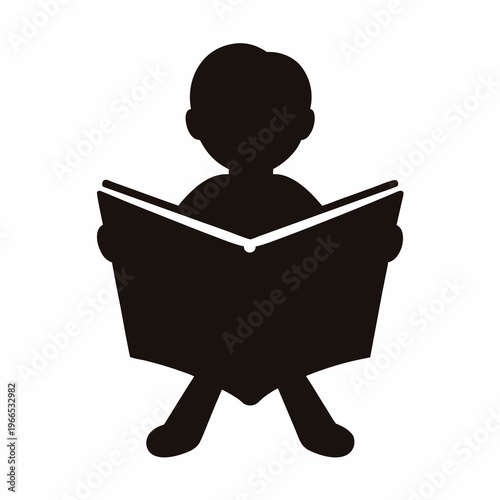 A black silhouette of a child reading a book in a chair