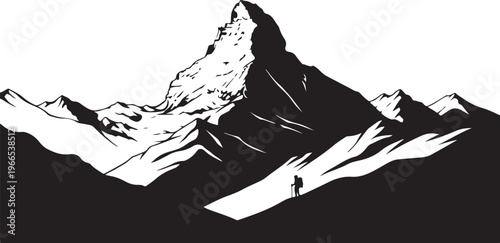 Hiker standing alone on a mountain peak in black and white