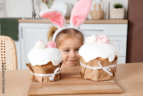 Cute happy little girl in b...