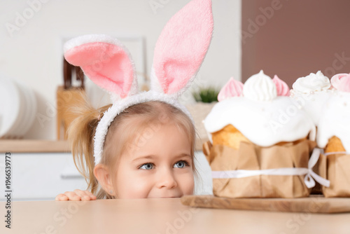 Cute happy little girl in b...