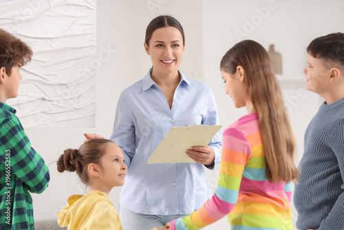 Female guide with children ...