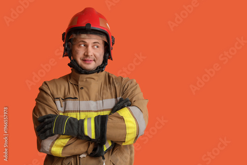 Male firefighter on orange ...