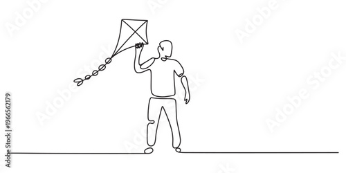 A single line drawing of a person standing and holding a kite with a long tail in their raised hand