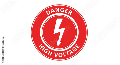 A close-up view of a high voltage warning sign with a lightning bolt symbol in an industrial setting.