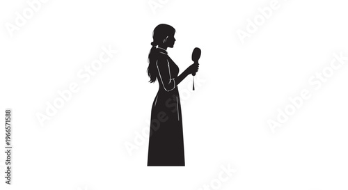 A woman holding a mirror in her hand silhouette