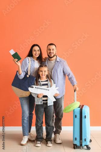 Family of travelers with pa...