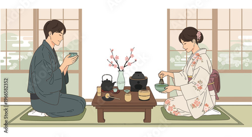 Japanese couple in traditional kimono enjoying tea ceremony at home