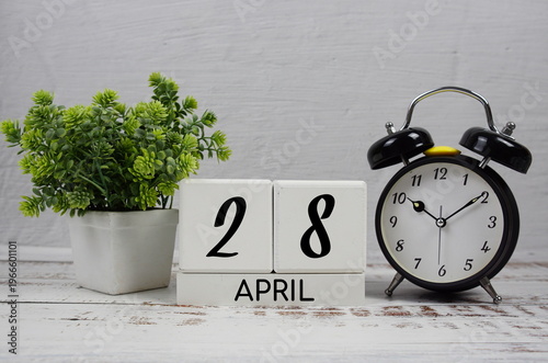 Wooden Calendar Showing the Date of April 28th. Day 28 of April month
