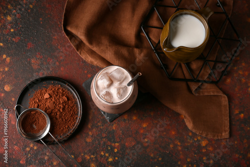 Glass of cold cocoa drink w...
