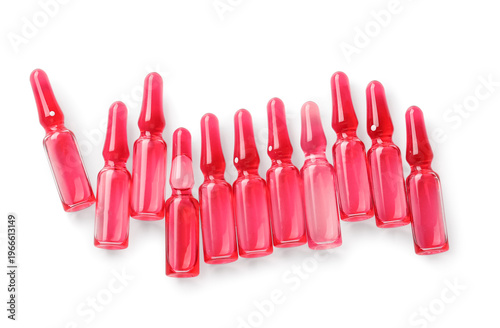 Many ampules with red liqui...