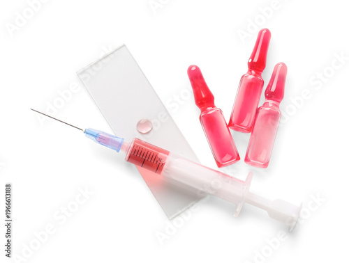 Ampules with red liquid, sy...