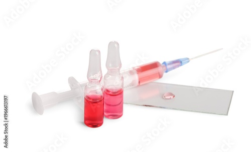 Ampules with red liquid, sy...
