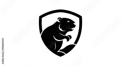 Black beaver silhouette inside a shield on white background
