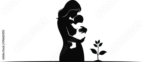 Elegant silhouette of mother holding her baby standing next to growing plant representing growth and new life concept.