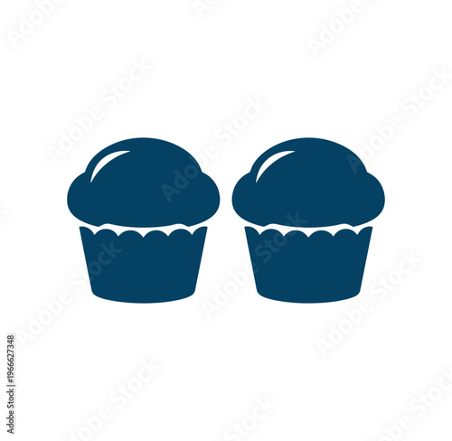 Two blue cupcakes with white icing isolated on white background
