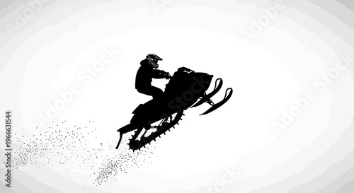 Snowmobile rider performing a jump in mid air striking black silhouette