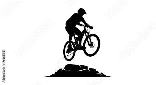 Mountain biker in mid air jump dynamic action sports silhouette
