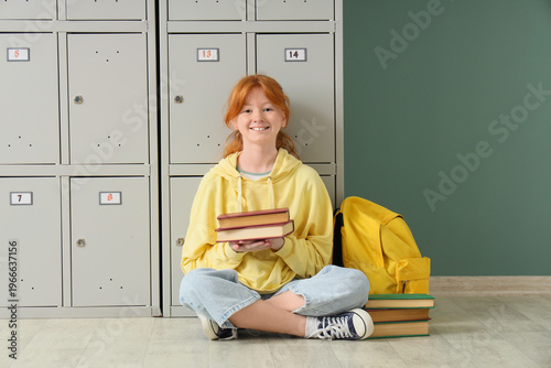 Teenage student with books ...