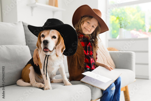 Cute little girl and Beagle...