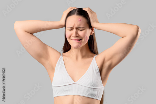Stressed young woman with a...