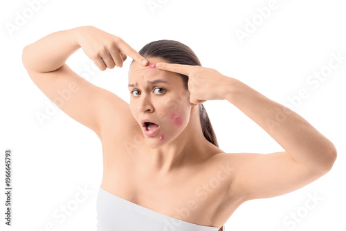 Shocked young woman pointin...