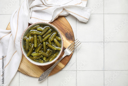 Bowl with tasty pickled cuc...