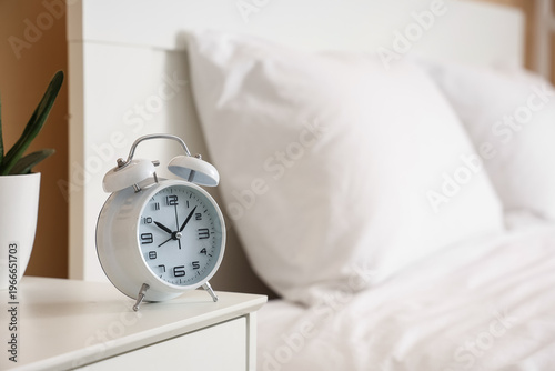 Retro alarm clock on table ...