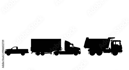 A row of commercial vehicles in stark black silhouette