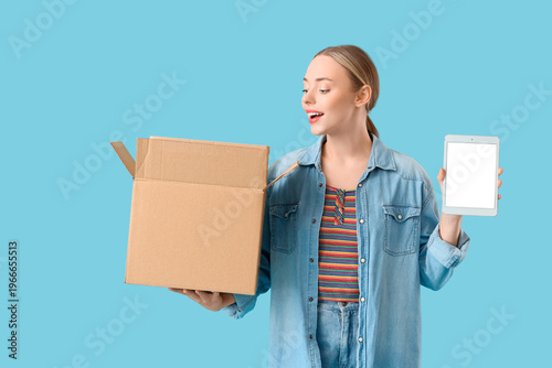 Young woman with parcel box...