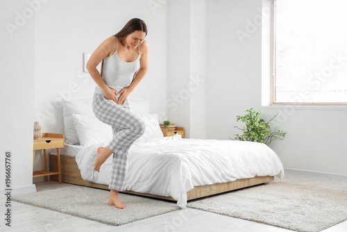 Young woman feeling discomf...
