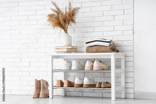 Stand with stylish shoes ne...
