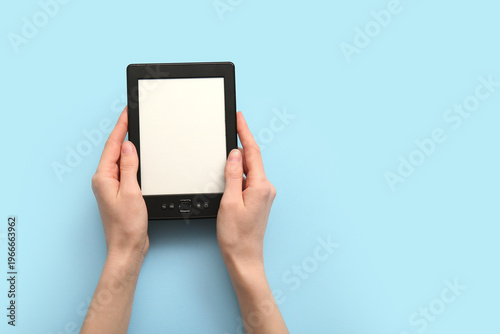 Female hands with modern e-...