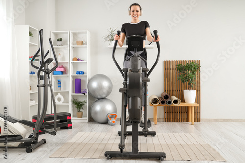 Sporty young woman with hea...