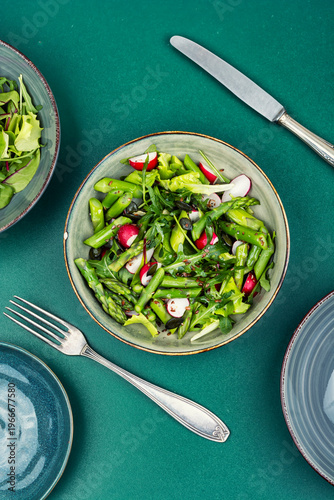 Green detox salad with asparagus radish and seeds