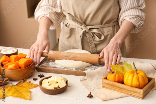 Woman preparing dough for t...
