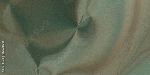 Obraz na płótnie Close-up view of a dark object on a greenish fabric surface