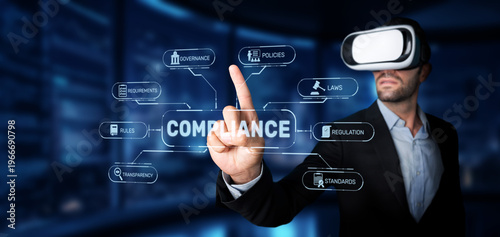 A businessman in a suit interacts with virtual compliance elements, exploring rules, regulations, and standards in a modern corporate setting through technology. XDMCP