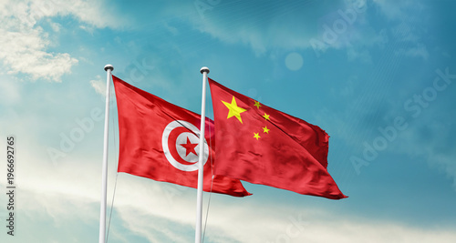 Foto Tunisia and China friendship flags are waving in the sky