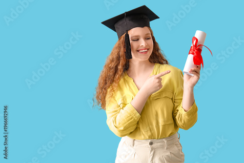 Happy female student in gra...